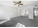 Bright bedroom featuring mirrored closet doors and grey carpeting at 4405 Vieux Carre Cir # 46, Tampa, FL 33613