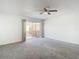 Bedroom with private balcony access and ceiling fan at 4405 Vieux Carre Cir # 46, Tampa, FL 33613