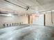 Attached garage with overhead door and ample space at 4405 Vieux Carre Cir # 46, Tampa, FL 33613