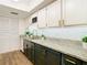 Modern kitchen with granite countertops and new cabinets at 4405 Vieux Carre Cir # 46, Tampa, FL 33613