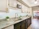 Updated kitchen with granite countertops and modern appliances at 4405 Vieux Carre Cir # 46, Tampa, FL 33613