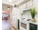 Bright kitchen features updated countertops and cabinets at 4405 Vieux Carre Cir # 46, Tampa, FL 33613