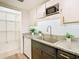 Updated kitchen with granite countertops and walk-in pantry at 4405 Vieux Carre Cir # 46, Tampa, FL 33613