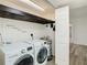 Laundry room with washer, dryer, and shelving at 4405 Vieux Carre Cir # 46, Tampa, FL 33613