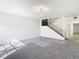 Spacious living room with carpeted floors and a chandelier at 4405 Vieux Carre Cir # 46, Tampa, FL 33613