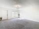 Bright and airy living room with grey carpet and large window at 4405 Vieux Carre Cir # 46, Tampa, FL 33613