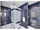 Spa-like bathroom with a walk-in shower and blue tile at 6208 Spoonbill Dr, New Port Richey, FL 34652
