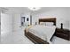 Spacious bedroom with ensuite bathroom and marble floors at 6208 Spoonbill Dr, New Port Richey, FL 34652
