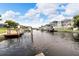 Scenic view of a canal with boats and waterfront homes at 6208 Spoonbill Dr, New Port Richey, FL 34652