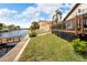 View of canal with walkway and deck at 6208 Spoonbill Dr, New Port Richey, FL 34652