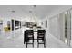 Bright dining room with modern chandelier and seating for four at 6208 Spoonbill Dr, New Port Richey, FL 34652