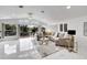 Relaxing living room with sectional sofa and water views at 6208 Spoonbill Dr, New Port Richey, FL 34652