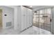 White pantry with ample storage space and sliding glass door at 6208 Spoonbill Dr, New Port Richey, FL 34652