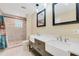 Updated bathroom with double sinks and walk-in shower at 911 Silver Palm Way, Apollo Beach, FL 33572