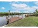 Private dock on the water with access to boating and fishing at 911 Silver Palm Way, Apollo Beach, FL 33572