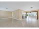 Bright and airy living room with tile floors and open concept design at 911 Silver Palm Way, Apollo Beach, FL 33572