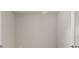 Empty storage room with neutral-colored walls and flooring at 12318 Hearts Ease St, Venice, FL 34293
