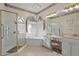 Spa-like bathroom with a large shower, corner tub, and double vanity at 16310 Ashington Park Dr, Tampa, FL 33647