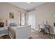 Bedroom with white twin bed and built-in closet at 16310 Ashington Park Dr, Tampa, FL 33647