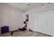 Home exercise room with rowing machine and weights at 16310 Ashington Park Dr, Tampa, FL 33647