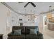 Modern kitchen with white cabinets, stainless steel appliances and island at 16310 Ashington Park Dr, Tampa, FL 33647