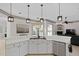 Spacious kitchen featuring a large island, stainless steel appliances, and ample counter space at 16310 Ashington Park Dr, Tampa, FL 33647