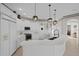 Modern kitchen with white cabinets, stainless steel appliances and ample counter space at 16310 Ashington Park Dr, Tampa, FL 33647