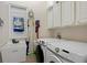 Laundry room with washer, dryer and utility sink at 16310 Ashington Park Dr, Tampa, FL 33647
