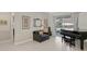 Spacious music room with a grand piano and access to the backyard at 16310 Ashington Park Dr, Tampa, FL 33647