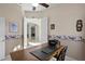 Home office with wooden desk and printer at 16310 Ashington Park Dr, Tampa, FL 33647