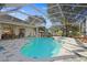 Escape to your own backyard oasis with this screened pool at 16310 Ashington Park Dr, Tampa, FL 33647