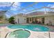 Large pool and spa with screened enclosure at 16310 Ashington Park Dr, Tampa, FL 33647