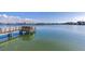 Private dock offering waterfront access and scenic views at 16323 Redington Dr, Redington Beach, FL 33708