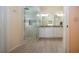 Elegant bathroom with granite countertops and walk-in shower at 324 Caloosa Palms Ct, Sun City Center, FL 33573