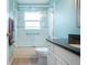 Updated bathroom featuring granite countertop and a tub shower combo at 324 Caloosa Palms Ct, Sun City Center, FL 33573