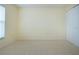 Well-lit bedroom featuring a window and closet at 324 Caloosa Palms Ct, Sun City Center, FL 33573