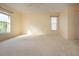 Spacious bedroom with large window and ceiling fan at 324 Caloosa Palms Ct, Sun City Center, FL 33573