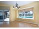 Dining room with view of pool and sliding door access at 324 Caloosa Palms Ct, Sun City Center, FL 33573