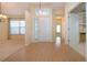 Bright and spacious entryway with wood flooring at 324 Caloosa Palms Ct, Sun City Center, FL 33573