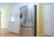 Stainless steel refrigerator in a bright kitchen at 324 Caloosa Palms Ct, Sun City Center, FL 33573