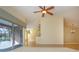 Open living area with a view of the pool and access to outdoor space at 324 Caloosa Palms Ct, Sun City Center, FL 33573