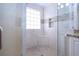 Large walk-in shower with tiled walls and seat at 324 Caloosa Palms Ct, Sun City Center, FL 33573