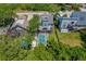Aerial view of the house and pool at 394 Ulelah Ave, Palm Harbor, FL 34683