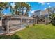 Large backyard with pool and home at 394 Ulelah Ave, Palm Harbor, FL 34683