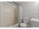 Clean bathroom with a shower/tub combo and white vanity at 394 Ulelah Ave, Palm Harbor, FL 34683