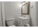 Bathroom with a white vanity and a framed mirror at 394 Ulelah Ave, Palm Harbor, FL 34683