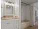 Clean bathroom with a tub and a vanity at 394 Ulelah Ave, Palm Harbor, FL 34683