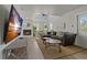 Spacious living room with fireplace, large TV and comfortable seating at 394 Ulelah Ave, Palm Harbor, FL 34683