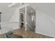 Upstairs loft area with a railing overlooking the lower floor at 394 Ulelah Ave, Palm Harbor, FL 34683