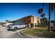 Brick building exterior with parking and landscaping at 4580 Overlook Ne Dr # 297, St Petersburg, FL 33703